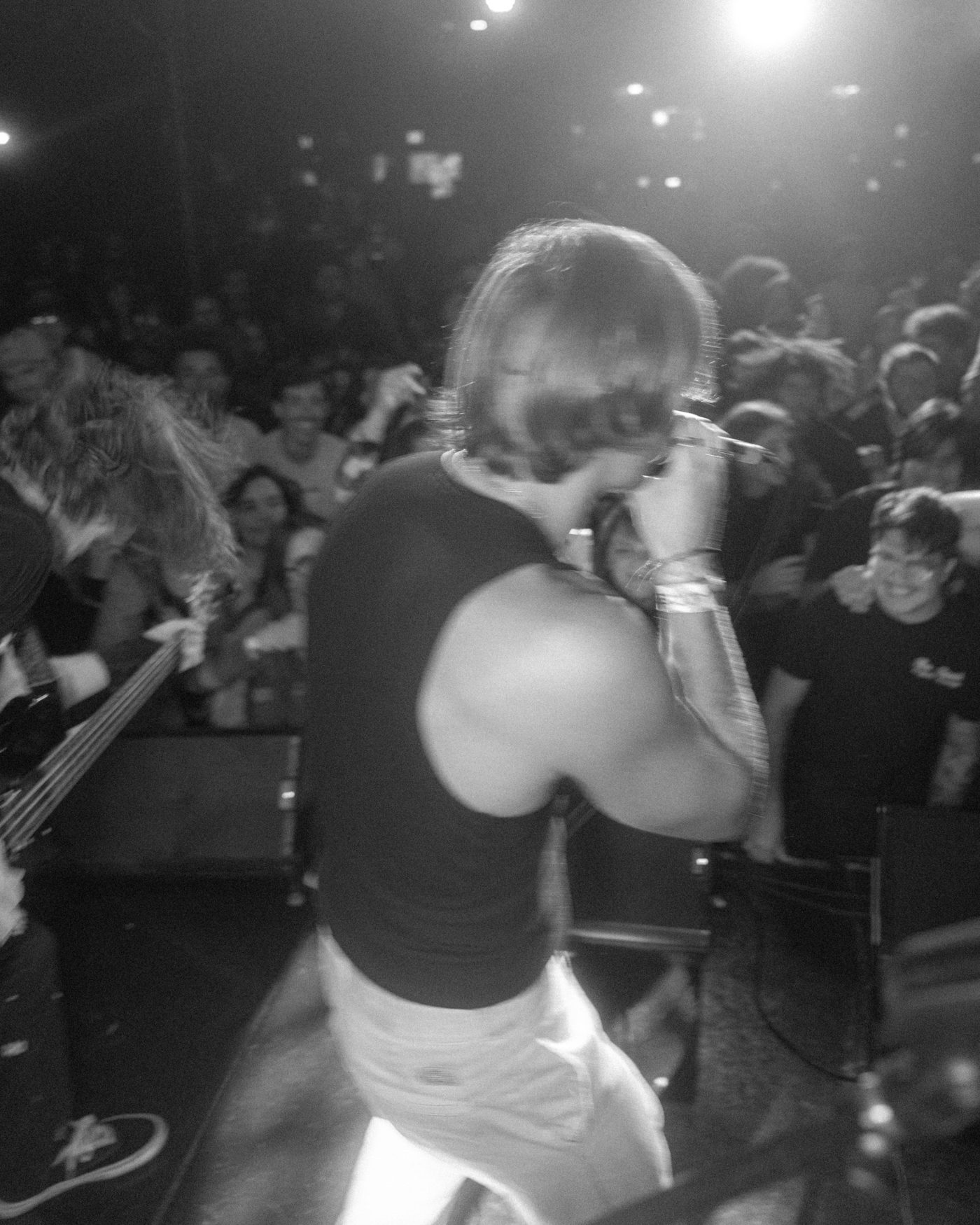 Marco facing a packed crowd